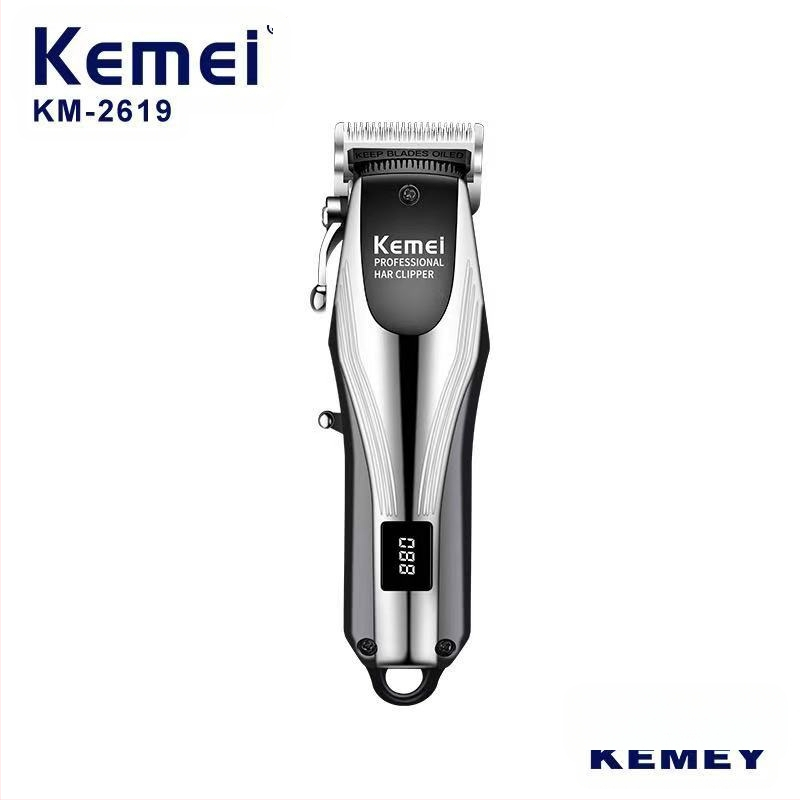 Komei KM-2619 įkraunamas plaukų kirpimo prietaisas su nerūdijančio plieno pjovimo galvute