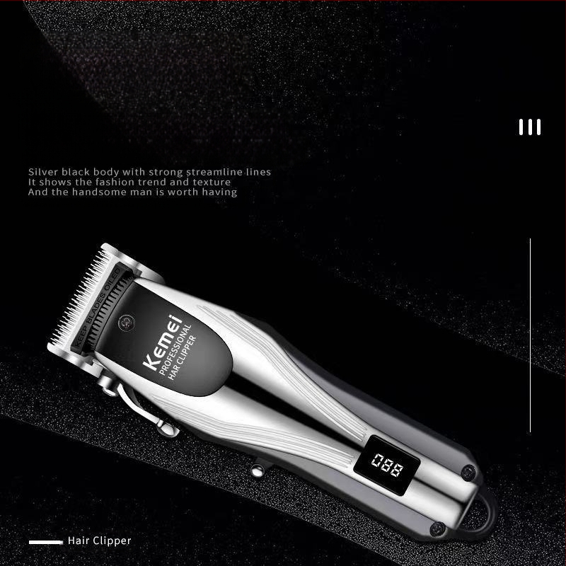 Komei KM-2619 įkraunamas plaukų kirpimo prietaisas su nerūdijančio plieno pjovimo galvute