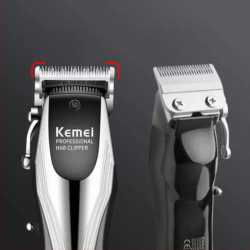 Komei KM-2619 įkraunamas plaukų kirpimo prietaisas su nerūdijančio plieno pjovimo galvute