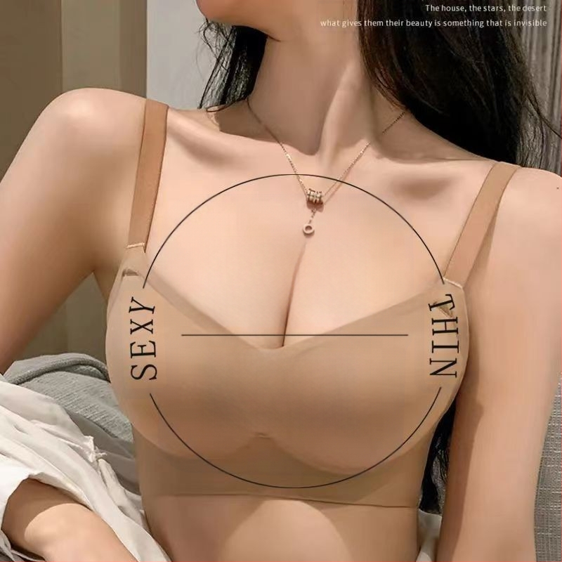 Be vielos liemenėlė su formuojančiais taurėmis, viršus plonas, apačia storesnė; pagrindinis audinys nailonas, pamušalas spandeks; fiksuoti dvigubi petnešos; nugaros užsegimas su trim sagtimis