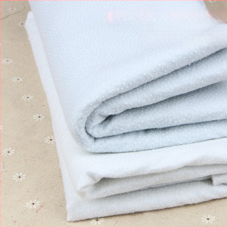 Dichu nepluoštinio audinio su vienpusiu lipniu pagrindu, storas pagalvėlės sluoksnis, 180 g/m², namų tekstilėms ir pakuotei