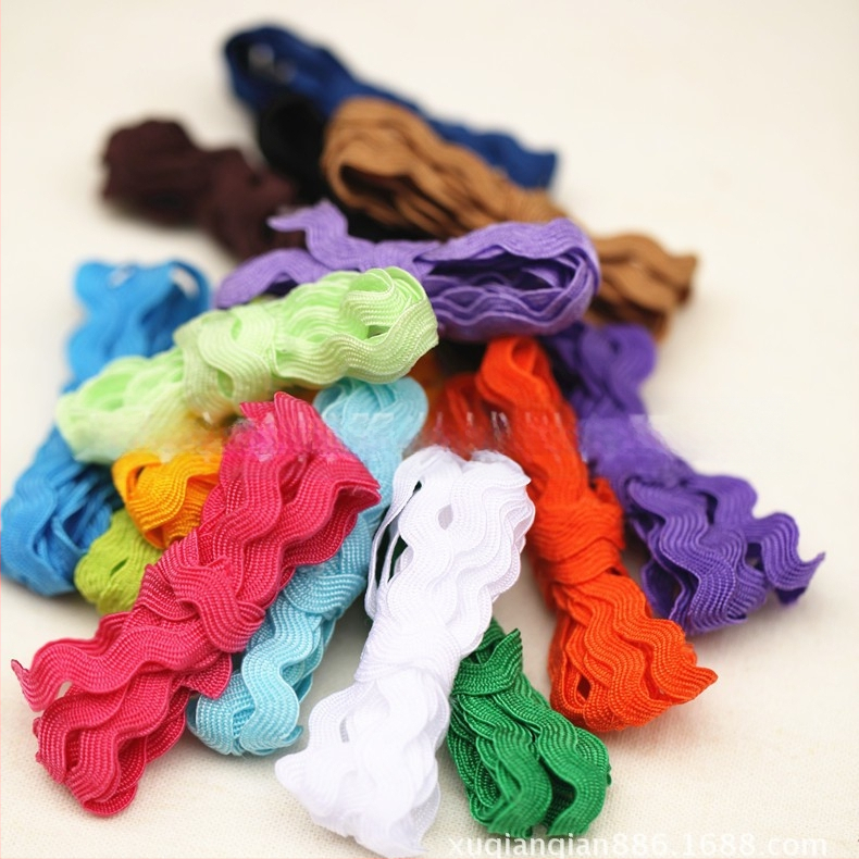 Poliesterio nėrinių juostelė drabužiams, S-formos vandens bangų raštas, įlenktas kraštas, Jumbo ženklas