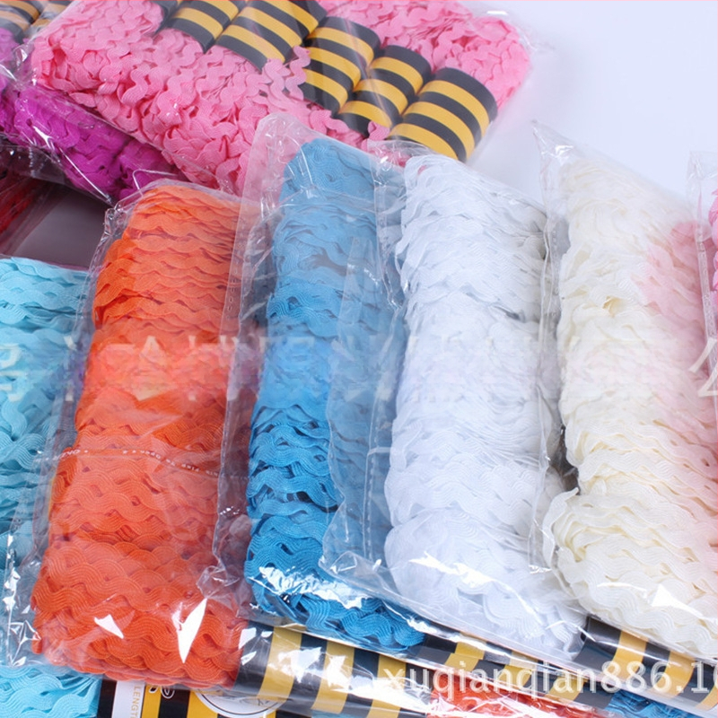 Poliesterio nėrinių juostelė drabužiams, S-formos vandens bangų raštas, įlenktas kraštas, Jumbo ženklas