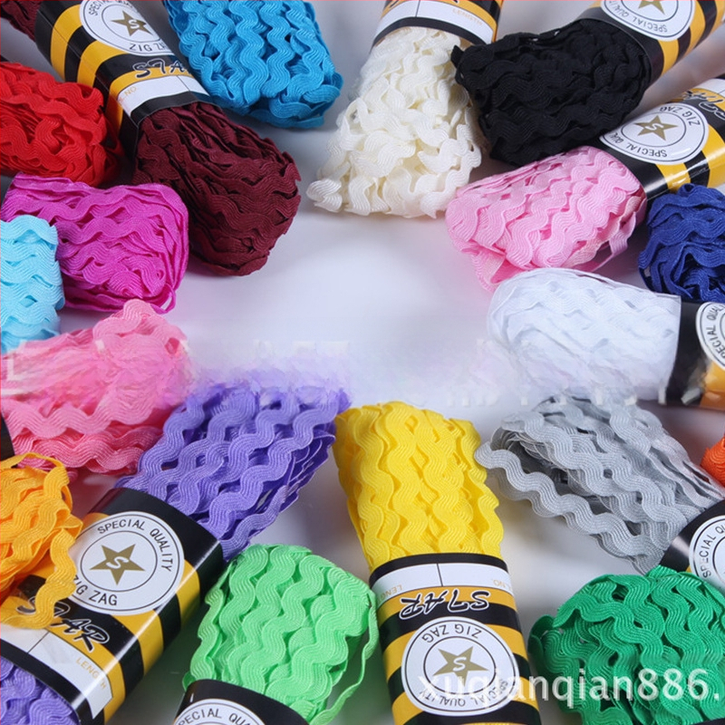 Poliesterio nėrinių juostelė drabužiams, S-formos vandens bangų raštas, įlenktas kraštas, Jumbo ženklas