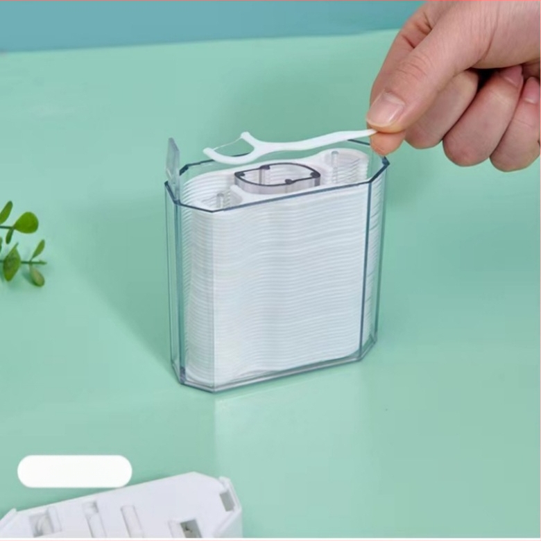 Automātiska zobu diegu kastīte ar 120 vienreizējām izliektām zobu diegu kociņām pieaugušajiem