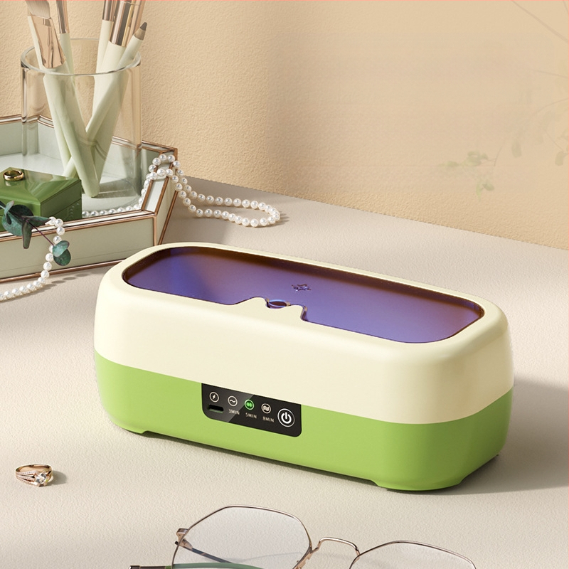 Čistač naočala i nakita — kompaktan, automatski, prijenosni; napajanje USB, suha baterija ili punjenje; napon 3,7 V; snaga 0,5 W; model QX-051; mehanički način rada