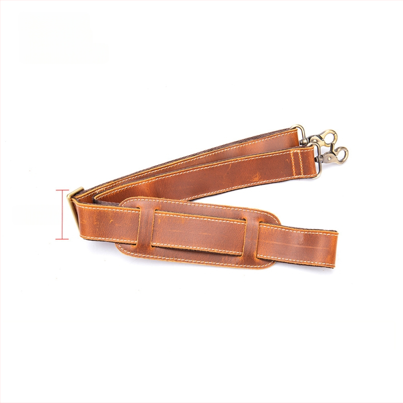 Odinė pečių juosta maišams – reguliuojama, viršutinio sluoksnio karvės odos, atspari dėvėjimuisi