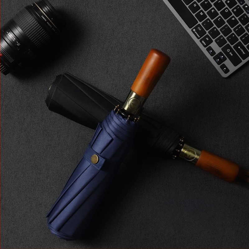 Ομπρέλα τριπλής αναδίπλωσης με χειρολαβή από συμπαγές ξύλο, σκελετός από ίνες με 10 ράβδους, ύφασμα 210T, άνοιγμα με αυτόματο μηχανισμό