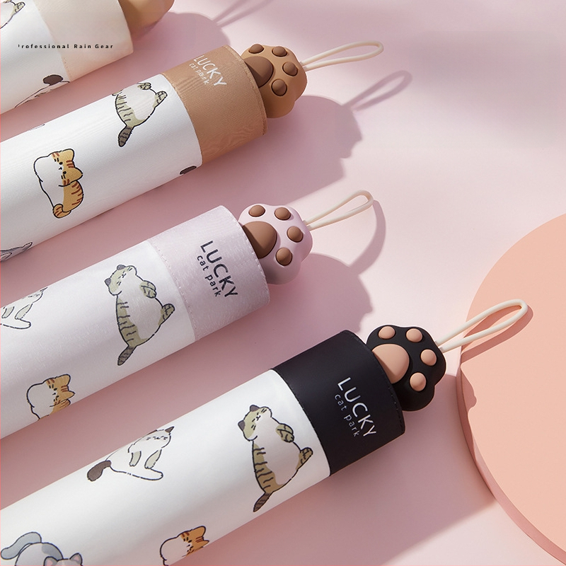 Saules lietussargs ar kaķa ķepas rokturi, Karikatūru dizains, Salokāms trīsdaļīgs lietussargs, UV aizsardzība UPF 40+, 8 spīļu konstrukcija, Manuāla atvēršana