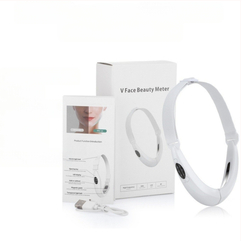 EMS mikro strāvas sejas masāžas ierīce ar attālināto kontroli, paredzēta pacelt un veidot V formas seju; funkcijas: negatīvie joni, infrasarkanais stars un krāsains gaisma; iebūvēts 300–500 mAh akumulators; IPX4 ūdensizturība.