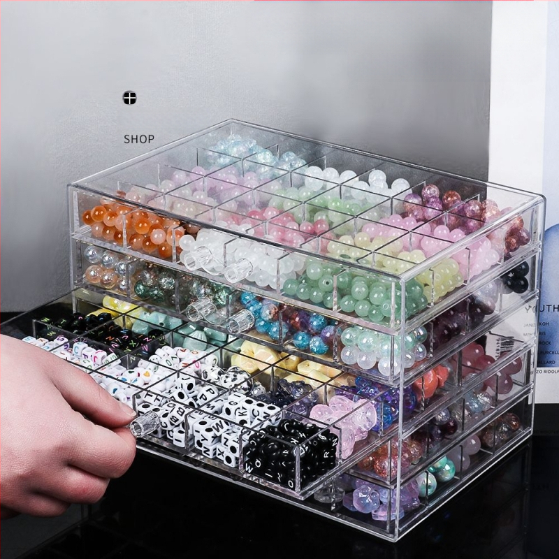 Atvilktņu tipa krellīšu uzglabāšanas kārba ar vairākām nodalēmām — plastmasas konstrukcija, juvelierizstrādājumu iepakojums