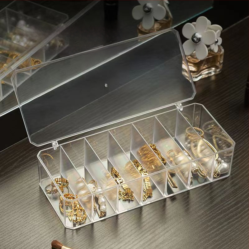 Atvilktņu tipa krellīšu uzglabāšanas kārba ar vairākām nodalēmām — plastmasas konstrukcija, juvelierizstrādājumu iepakojums