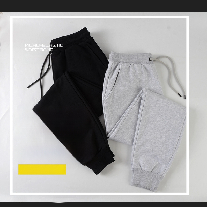 Pamukaste hlače slobodnog kroja s visokim strukom i vezicom za prilagodbu (95% pamuka)