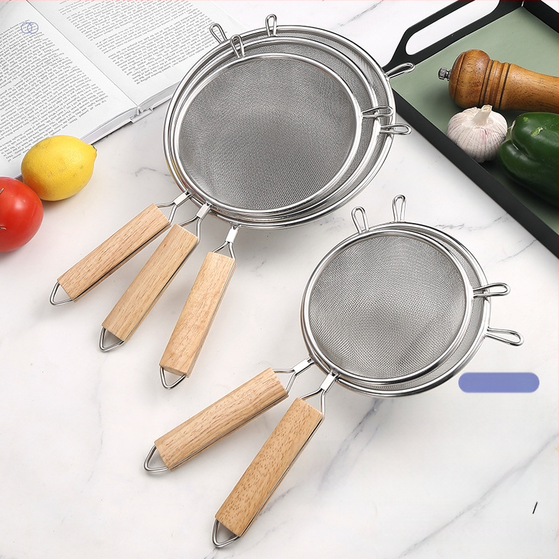 Nerūsējošā tērauda fritēšanas lāpsta ar koka rokturi, divgalvu konstrukcija, pretslīdēšana, aizsardzība pret apdegumiem