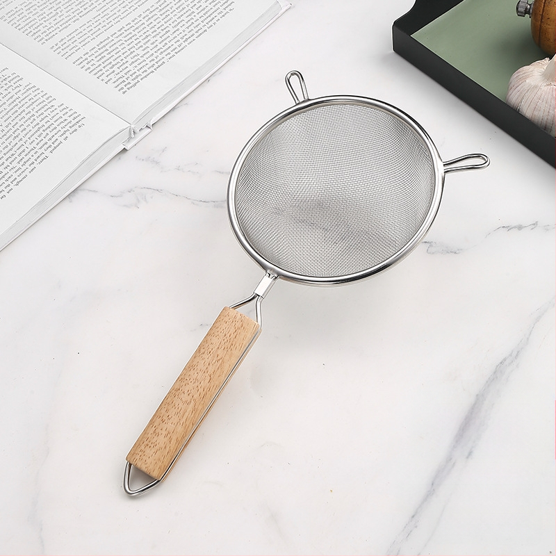 Nerūsējošā tērauda fritēšanas lāpsta ar koka rokturi, divgalvu konstrukcija, pretslīdēšana, aizsardzība pret apdegumiem