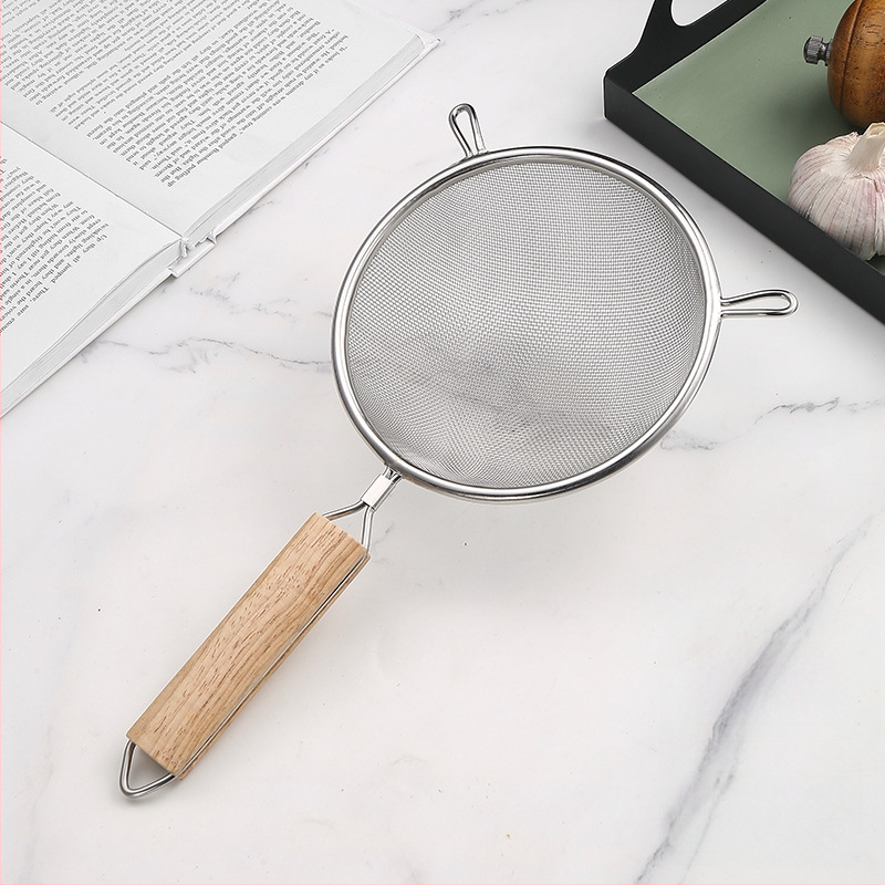 Nerūsējošā tērauda fritēšanas lāpsta ar koka rokturi, divgalvu konstrukcija, pretslīdēšana, aizsardzība pret apdegumiem