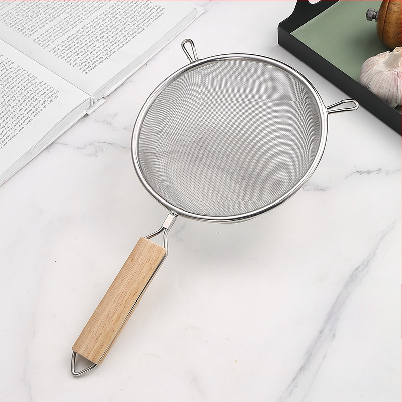 Nerūsējošā tērauda fritēšanas lāpsta ar koka rokturi, divgalvu konstrukcija, pretslīdēšana, aizsardzība pret apdegumiem