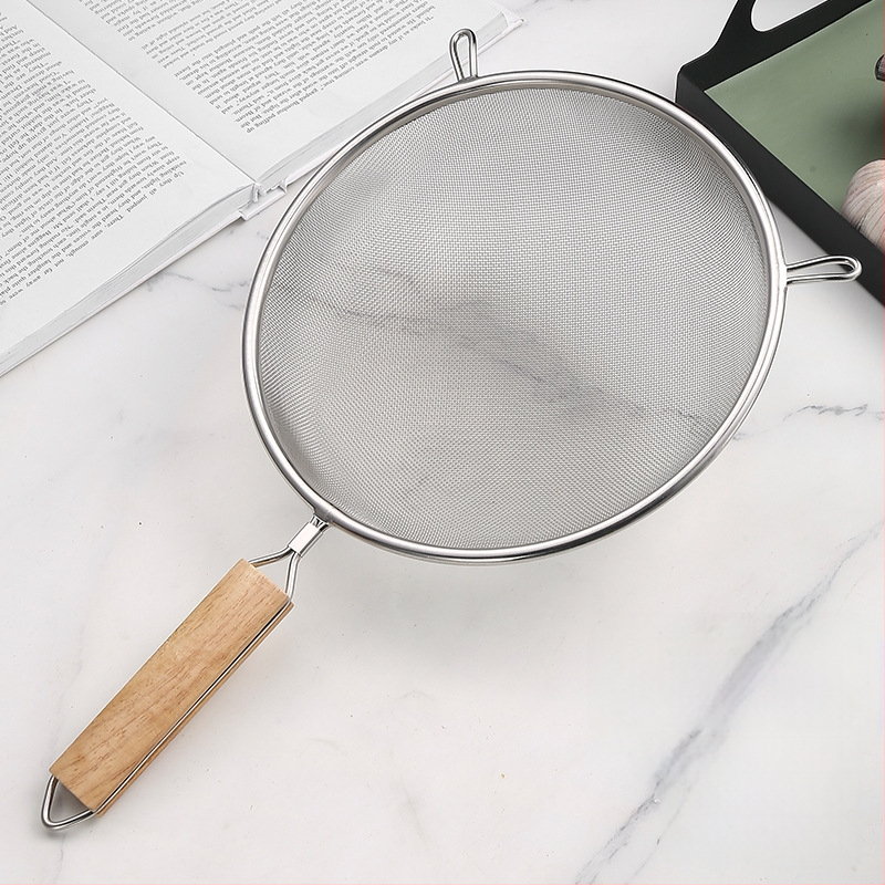 Nerūsējošā tērauda fritēšanas lāpsta ar koka rokturi, divgalvu konstrukcija, pretslīdēšana, aizsardzība pret apdegumiem