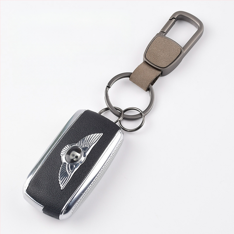 Atslēgu piekariņš – liellopa āda, viegls luksusa stils, metāla automobiļu atslēgu ķēde