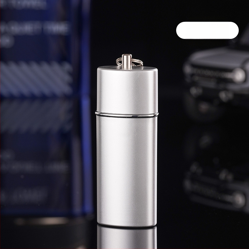 YF607 Kompaktā metāla pelnu vāciņa ar atslēgu piekariņu – ABS + nerūsējošais tērauds; nav vienreizējās lietošanas; funkcijas: atslēgu piekariņš, dekors, uzglabāšana; logotips drukāts