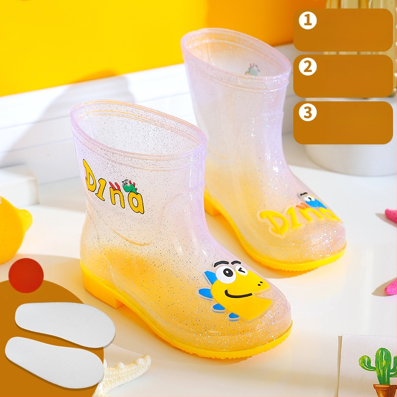 Bērnu lietuss zābaki - PVC augšdaļa, vidējā caurules augstums, zems papēdis 1–3 cm, burti-dinozaura raksts, animācijas stils