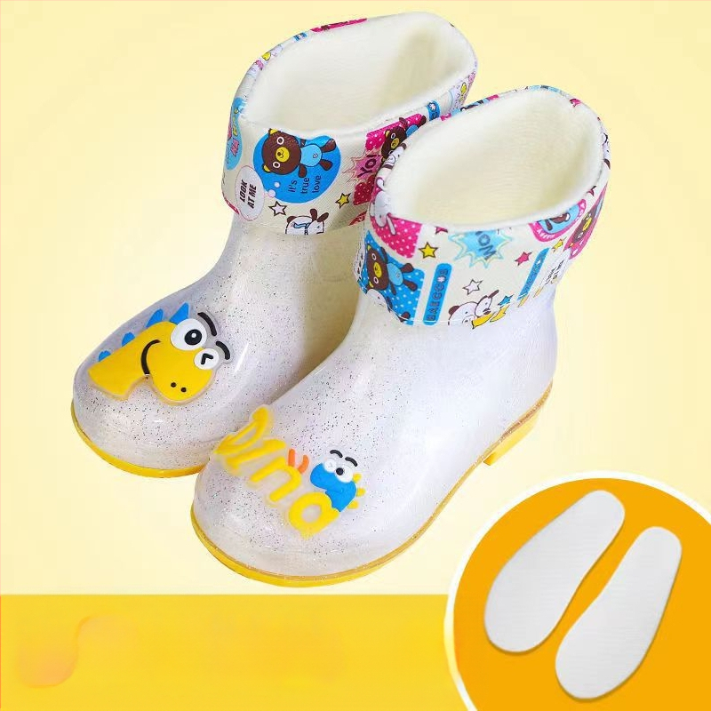 Bērnu lietuss zābaki - PVC augšdaļa, vidējā caurules augstums, zems papēdis 1–3 cm, burti-dinozaura raksts, animācijas stils