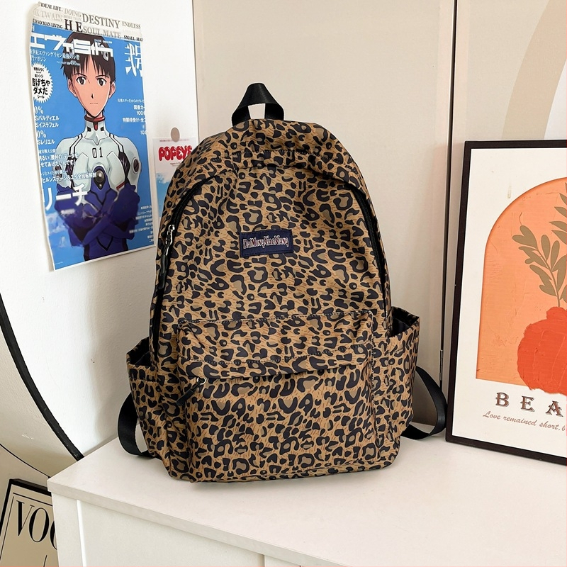 Neilona mugursoma ar leoparda rakstu, ultra viegla, ar gaisa spilveniem plecu siksnās, poliestera oderes iekšpuse