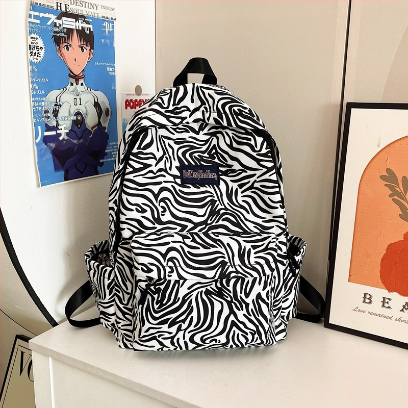 Neilona mugursoma ar leoparda rakstu, ultra viegla, ar gaisa spilveniem plecu siksnās, poliestera oderes iekšpuse