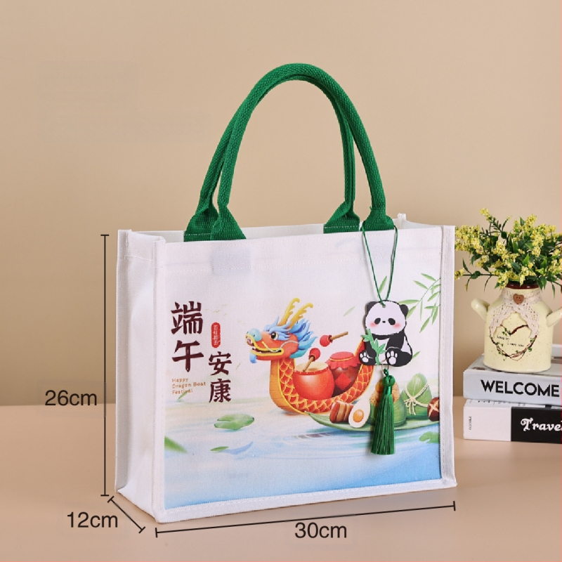 Dovanų įpakavimo krepšys su laminuota drobe; aplinkai draugiškas poliesterio ir medvilnės mišinys; logotipo spauda prieinama; spausdinimo metodai: serigrafinė spausda, mašininė spausda, skaitmeninė spausda, šilumos pernešimas