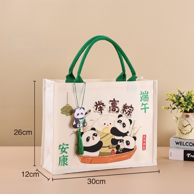 Dovanų įpakavimo krepšys su laminuota drobe; aplinkai draugiškas poliesterio ir medvilnės mišinys; logotipo spauda prieinama; spausdinimo metodai: serigrafinė spausda, mašininė spausda, skaitmeninė spausda, šilumos pernešimas