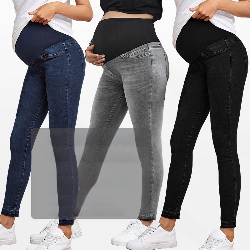 Nėščiųjų džinsinės kelnės su aukštu juosmeniu ir pilvo palaikymu, siauras kirpimas, mikroelastinis audinys (džinsas; medvilnė 50–70%; poliesteris 30–50%)