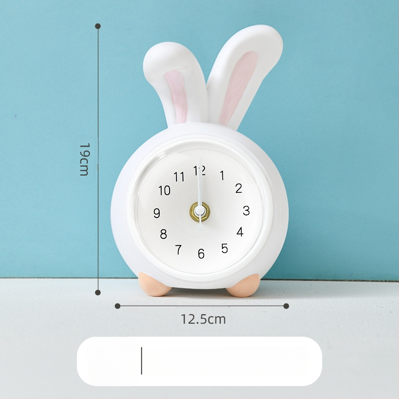 Vaikų stalo laikrodis su taupymo dėžute ir naktiniu apšvietimu, baterijomis maitinamas mechaninis judesys, vienpusis plastikinis korpusas, animacinio stiliaus