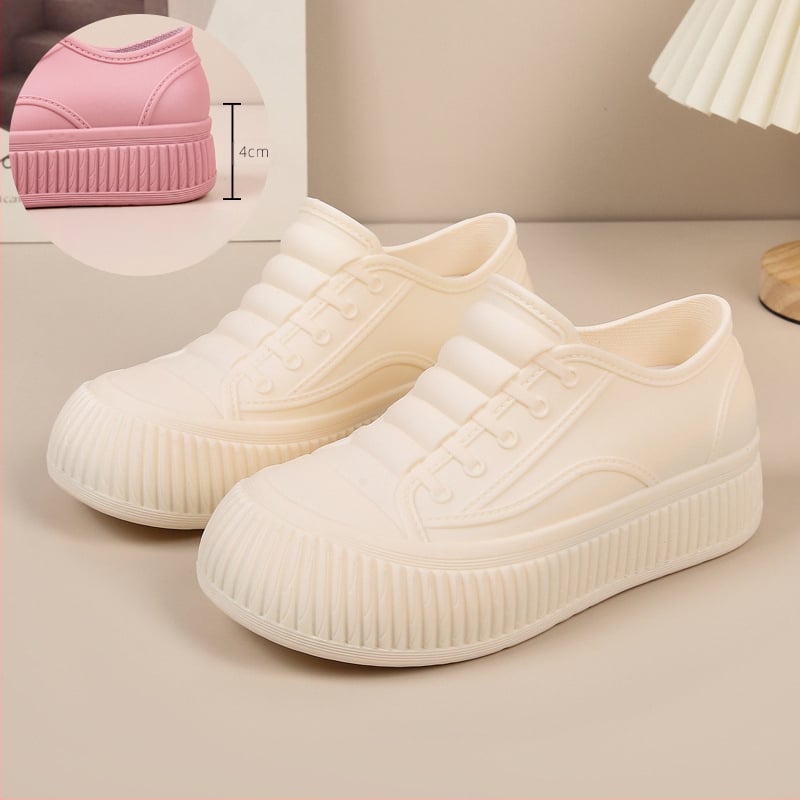 Sieviešu lietuszābaki - ūdensizturīgi PVC augšdaļa, zemāks augums, slip-on, zem papēža 1–3 cm