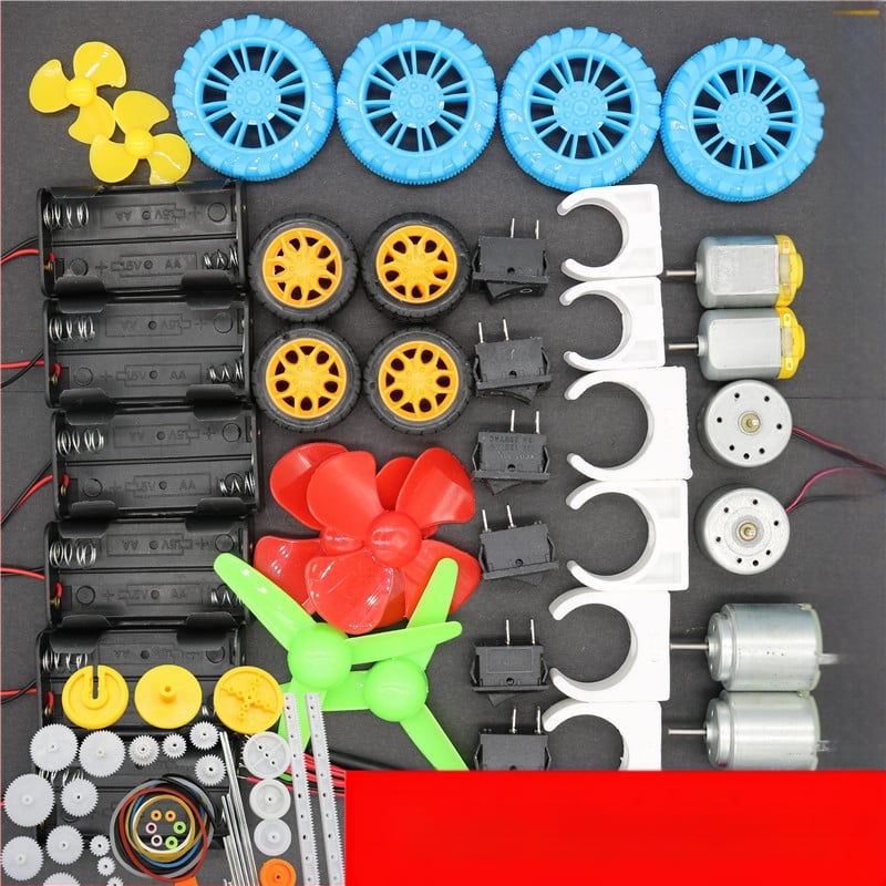 B medžiagų rinkinys, apie 140 komponentų: pavarų variklis, baterijų dėžutė, ratų modelio rinkinys