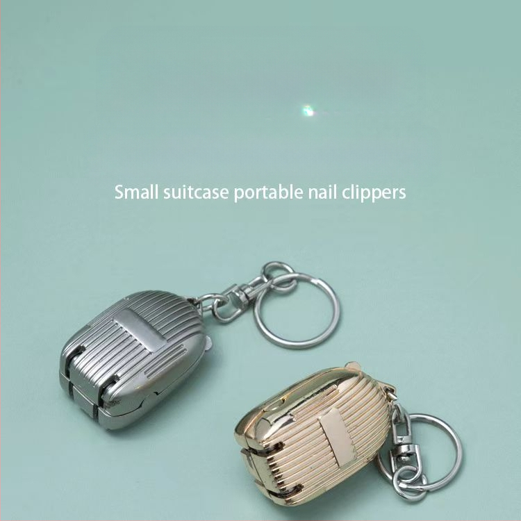 Sulankstomas nagų kirpiklis su purslų apsauga, iš nerūdijančio plieno, tinkamas 6+ metų amžiaus