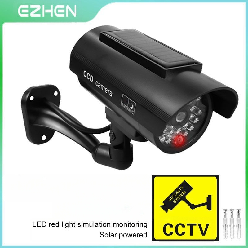 Saulės energija varoma simuliuojama stebėjimo kamera, skirta vidaus ir lauko naudojimui, atspari vandeniui (maitinimo įtampa: 3V, medžiaga: ABS plastikas, svoris: 0.227 kg, darbinė temperatūra: -5–50°C)