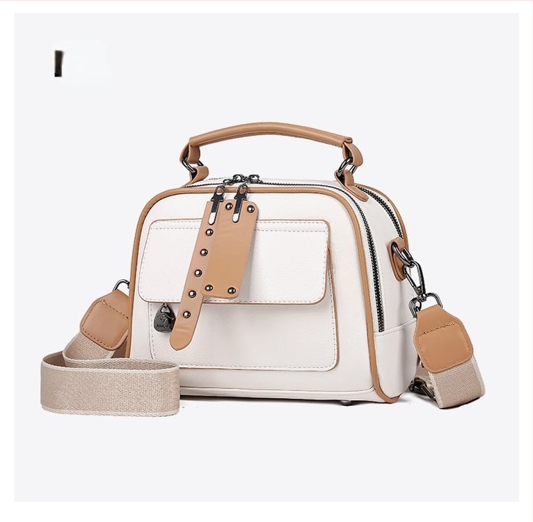 PU kvadratinė pečių krepšys su metaliniais detalėmis, užtrauktukas, poliesterio padas; vidinės kišenės: užtrauktukinė kišenė, telefono kišenė, ID kišenė; vienas pečių diržas; horizontali kvadrato forma.