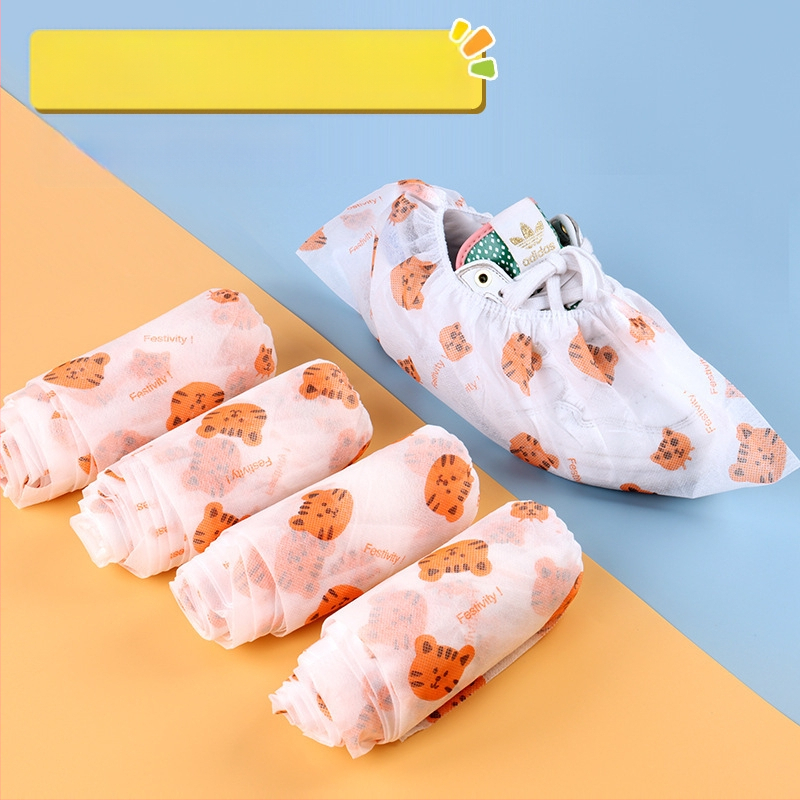 Κάλυμματα παπουτσιών μίας χρήσης από μη υφασμένα υλικά με εκτύπωση, εσωτερική χρήση, ενήλικοι, προστασία από σκόνη, συσκευασία 50/100