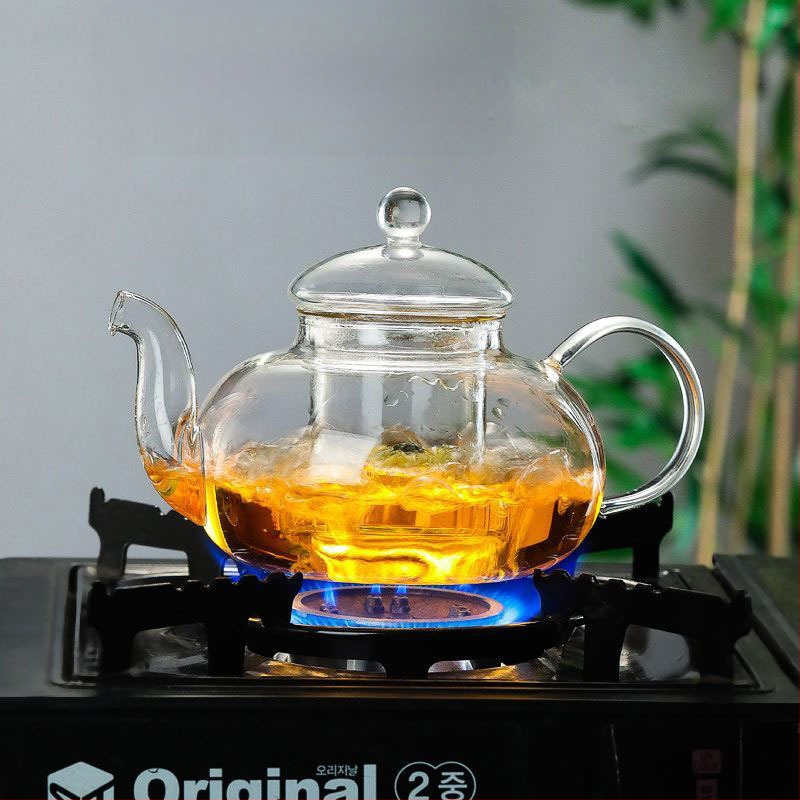 Stiklinis arbatinukas žiedinei arbatai su filtru, virimo funkcija, pritaikomas, įpakuotas į popierinę dėžutę