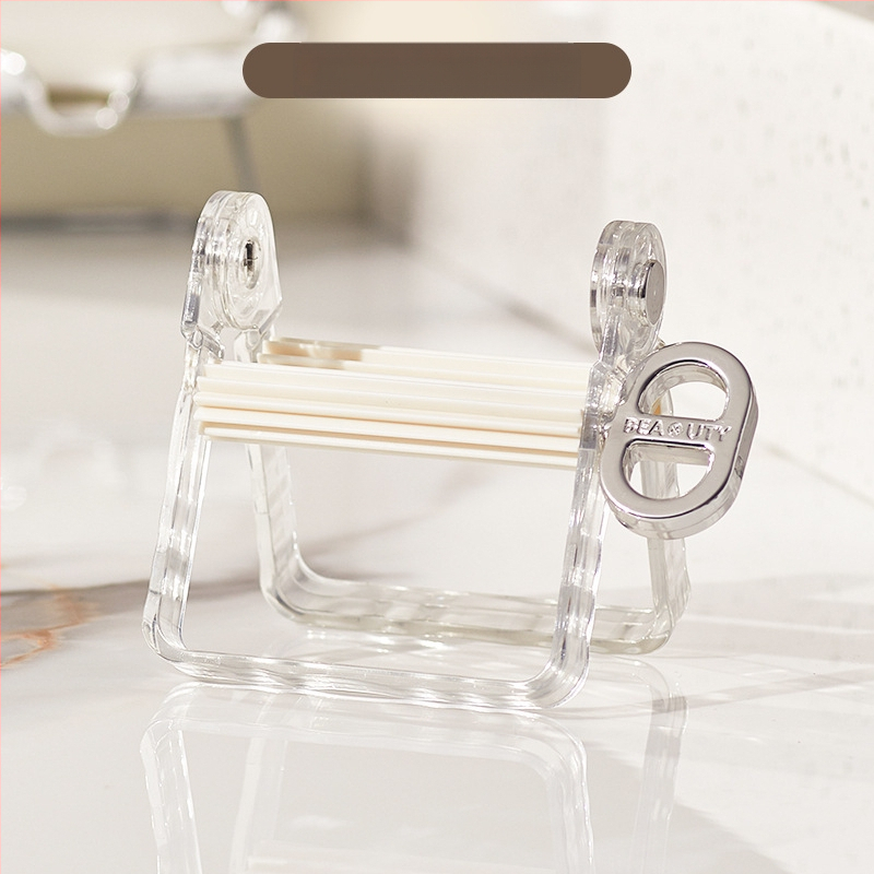 Rankinis dantų pastos dozatorius namų naudojimui