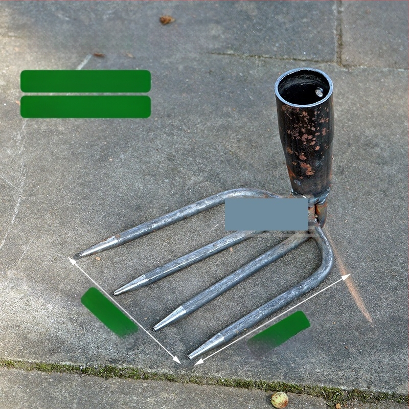 Vrtna metalna grablja sa dva zuba i hvataljkom