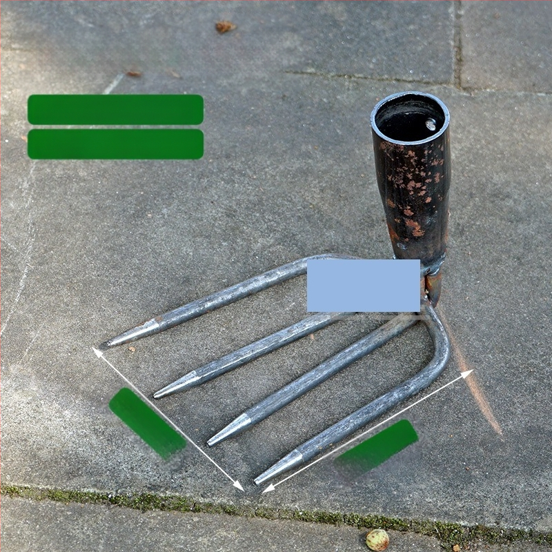 Vrtna metalna grablja sa dva zuba i hvataljkom