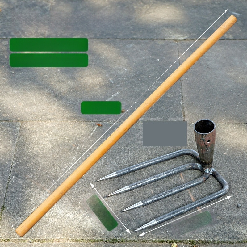 Vrtna metalna grablja sa dva zuba i hvataljkom