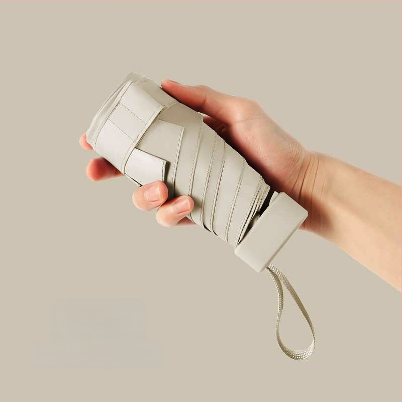 Ομπρέλα ήλίου σε κάψουλα, συμπαγής και ελαφριά, 6-ραβδική ατσάλινη ράβδος, πολυεστερικό ύφασμα 190T, UPF50+, χειροκίνητο άνοιγμα