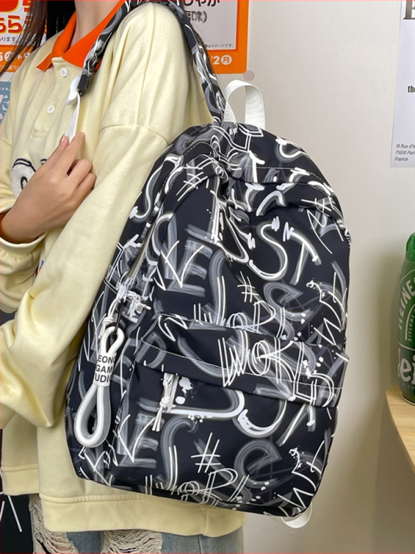 Lányok iskolai hátizsák – ultrakönnyű, nagy kapacitású, nylonból, légpárnás vállpántokkal, poliészter bélés, betűmintás dizájn, iskola használatra