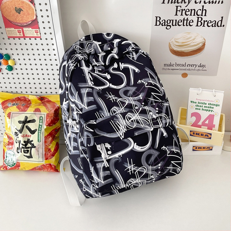 Lányok iskolai hátizsák – ultrakönnyű, nagy kapacitású, nylonból, légpárnás vállpántokkal, poliészter bélés, betűmintás dizájn, iskola használatra