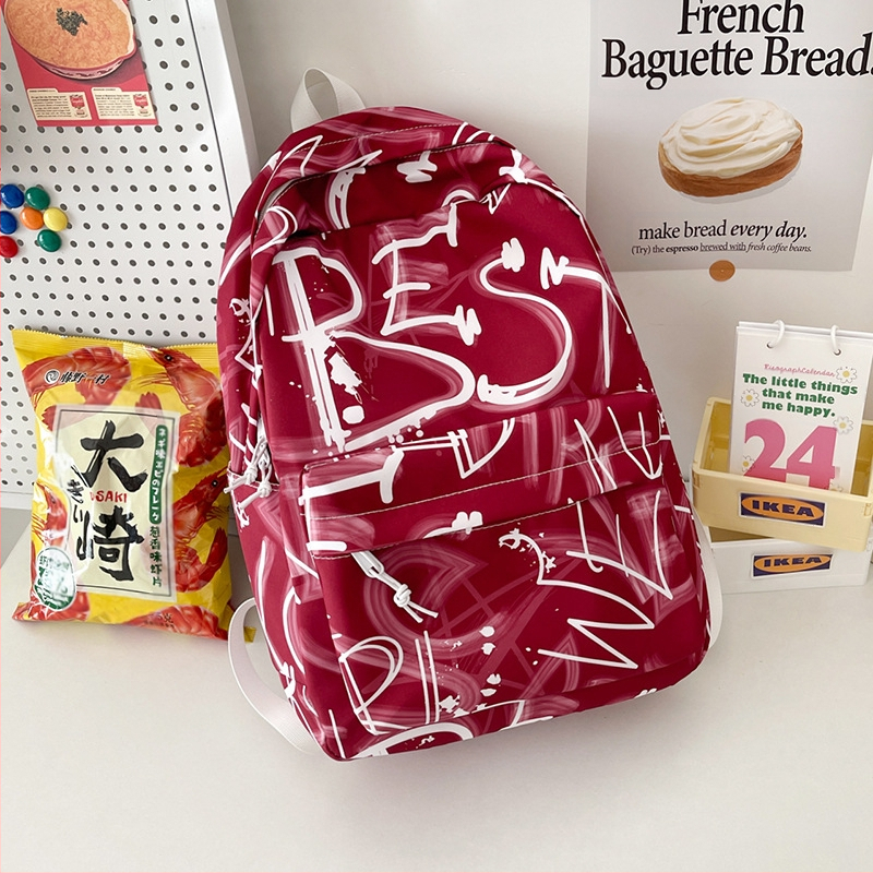 Lányok iskolai hátizsák – ultrakönnyű, nagy kapacitású, nylonból, légpárnás vállpántokkal, poliészter bélés, betűmintás dizájn, iskola használatra