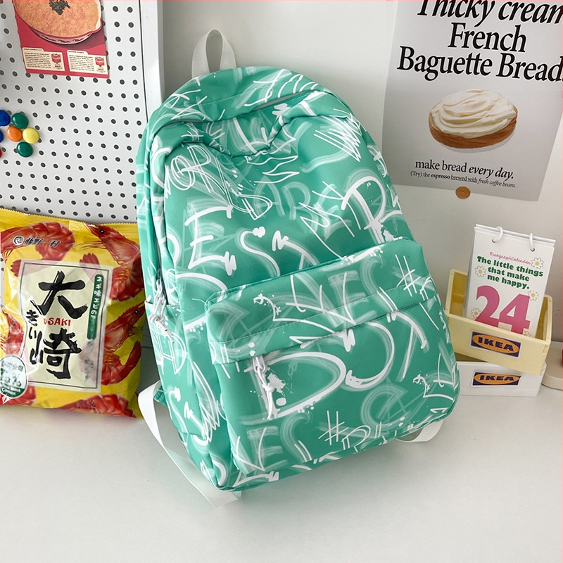 Lányok iskolai hátizsák – ultrakönnyű, nagy kapacitású, nylonból, légpárnás vállpántokkal, poliészter bélés, betűmintás dizájn, iskola használatra