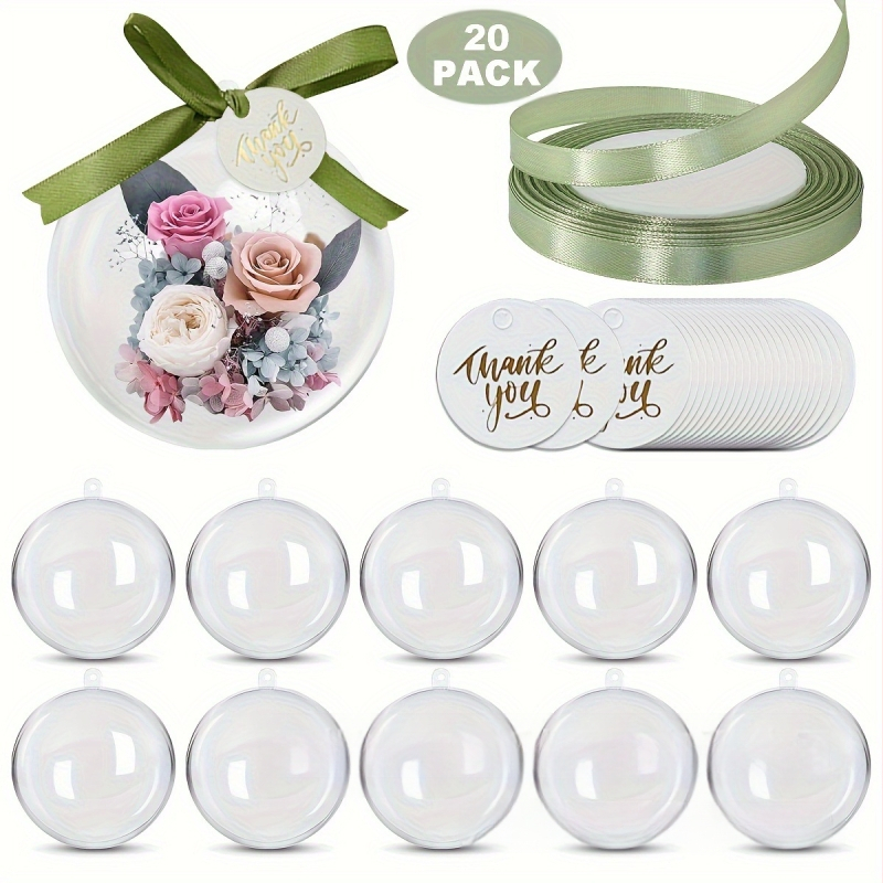 Kerek áttetsző műanyag ajándékdoboz köszönő címkékkel és szalagokkal