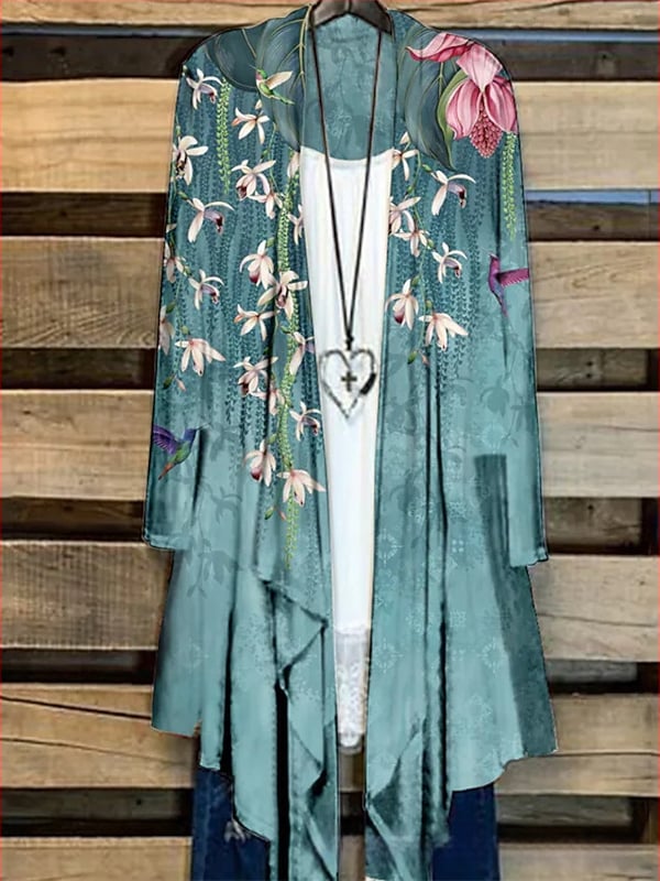 Moteriški marškiniai su ilgomis rankovėmis su spauda, ilgesnė kirpimo linija ir kailio apykakle, poliesteris